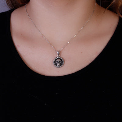 Pingente de Prata com Caveira.