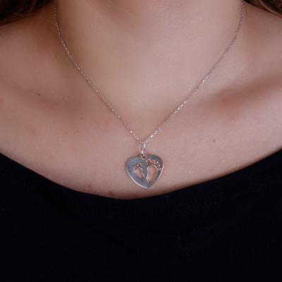 Pingente de Prata Pés.