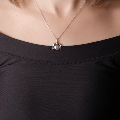 Pingente de Prata Pilates.